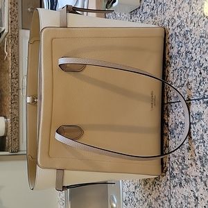 "The knott" colorblocked large tote by Kate Spade https://www.katespade.com/prod